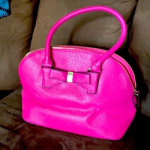 This is a pink purse